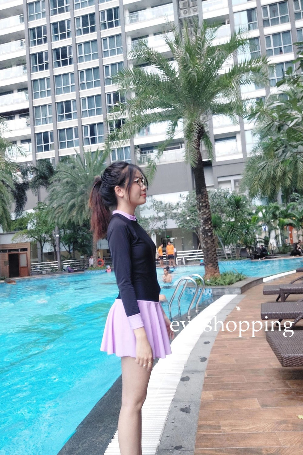 Đồ bơi nữ dài tay dạng váy màu tím kín đáo BKN1036